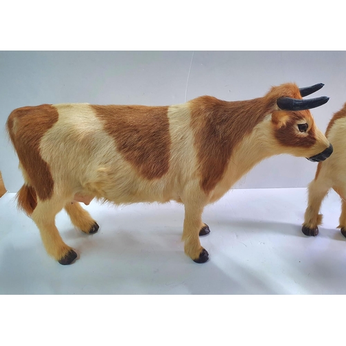 292 - Pair of vintage, folk art, cows with real cowshide (2),

Both approx 50cm long x 31 cm tall