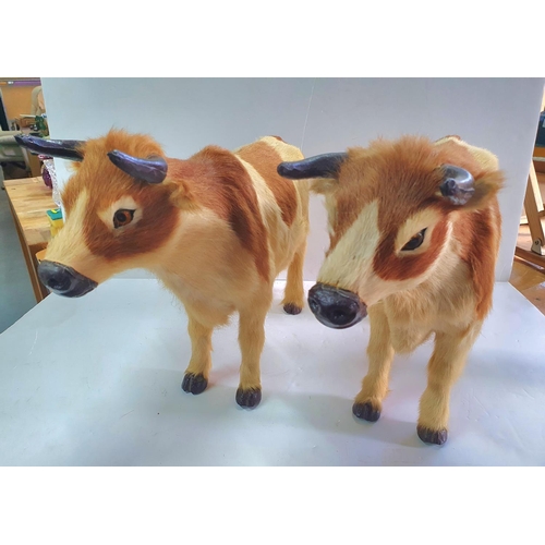 292 - Pair of vintage, folk art, cows with real cowshide (2),

Both approx 50cm long x 31 cm tall