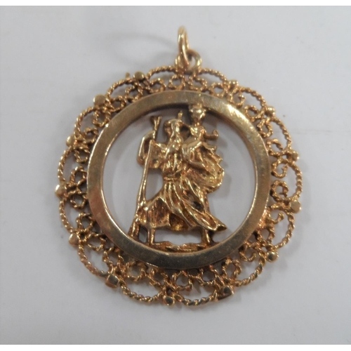 33 - 9ct yellow gold circular St Christopher pendent,

4.1 grams