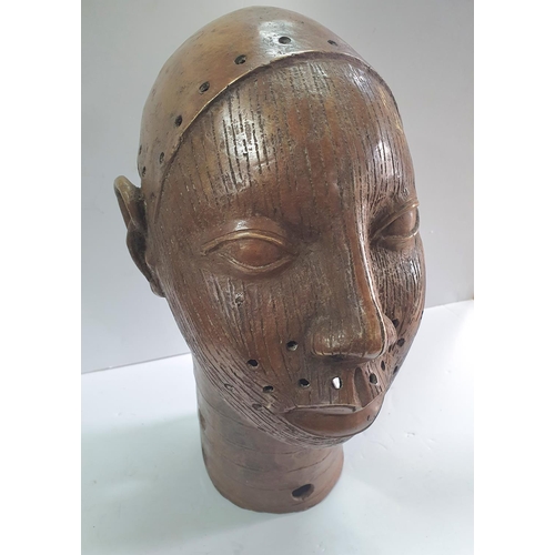 279 - Large Benin bronze, head mask,

38 cm tall,          4.6 Kgs