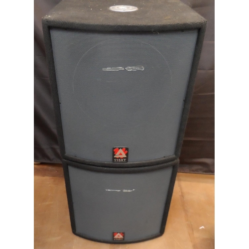 311 - A pair of Peavey X series 115XT PA speakers with side carry handles and metal pole inserts