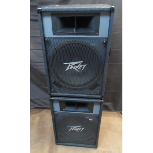 312 - A pair of Peavey PA speakers with side carry handles and metal pole inserts