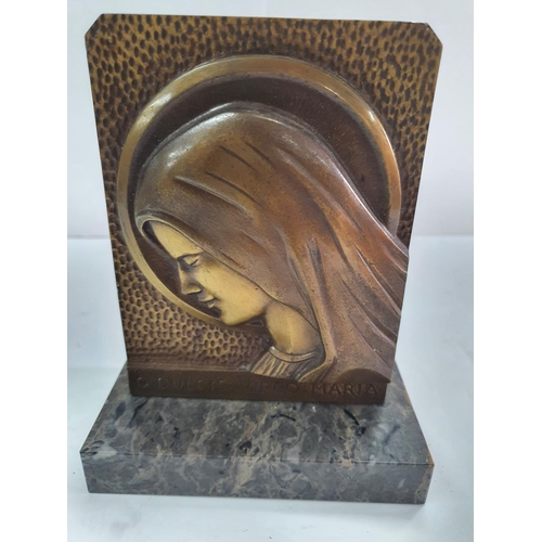 192 - Early 20thC European bronze plaque depicting the Virgin Mary, sat on a marble plinth inscribed with ... 