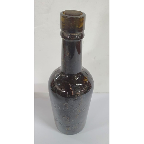 215 - Collection of 19th and 20thC beer and pop bottles including a stout bottle with its stopper still in... 