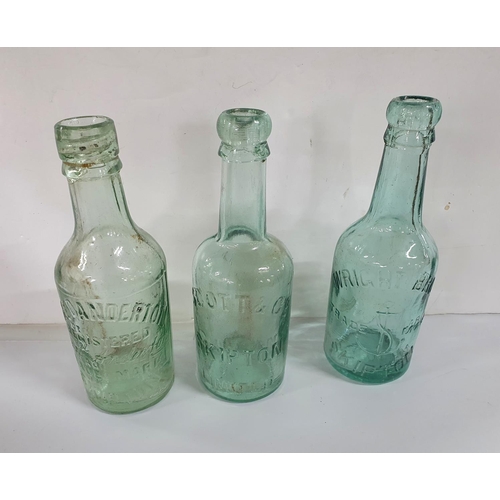 215 - Collection of 19th and 20thC beer and pop bottles including a stout bottle with its stopper still in... 