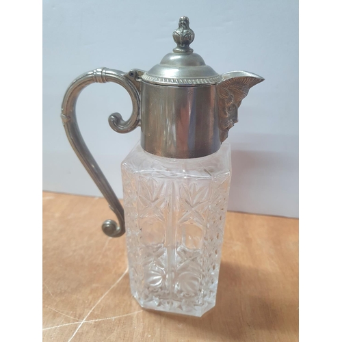 223 - Victorian cruet set on stand together with a half claret jug and a fine pair of ornate plated candle... 