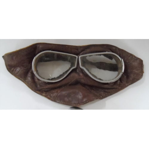 241 - Collection of items to include a pair of early motorbike goggles, Ingersol pocket watch and numerous... 