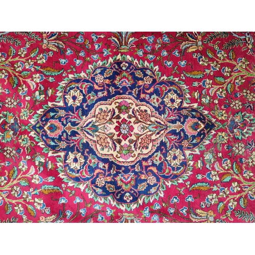 563 - Large old, fine quality Indian tasselled rug in traditional pattern,

385 x 275 cm