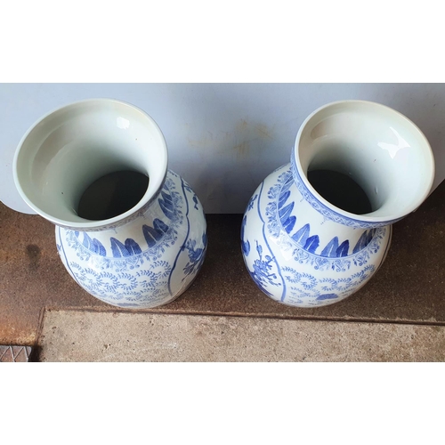 406 - Pair of 20thC large Chinese blue & white vases (2),

Both measure 46 cm tall