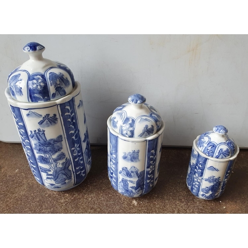 409 - Set of 3 20thC Chinese blue & white graduating vases' (3),

Largest is 29cm tall