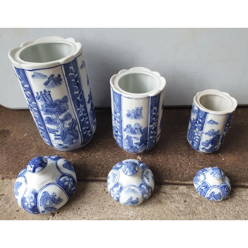 409 - Set of 3 20thC Chinese blue & white graduating vases' (3),

Largest is 29cm tall