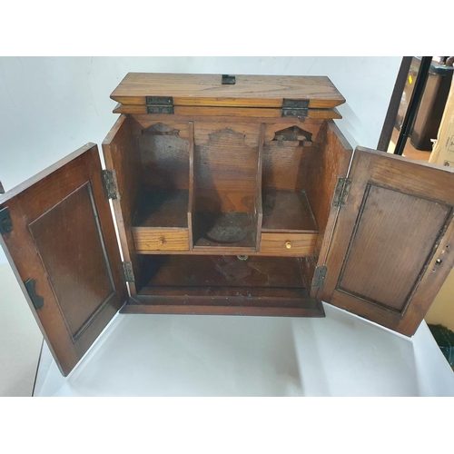 249 - Edwardian Oak smokers cabinet with Art Nouveau decoration to doors