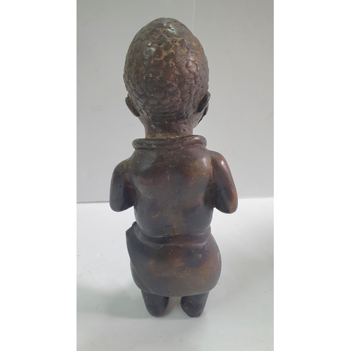 274 - Solid cast African bronze of a man, possibly West African/Benin,

21 cm tall            1.27 Kgs