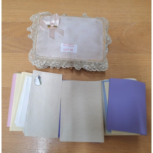 16 - Cloth covered small wicker box containing pastel coloured writing paper and envelopes