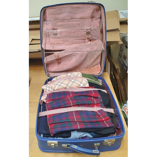 18 - Large vintage Antler blue suitcase filled with clean ladies clothes