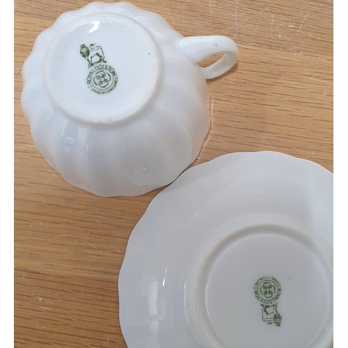 140 - Five Royal Doulton porcelain cups and saucers (5)