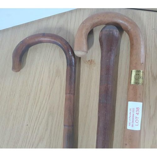 438 - Three 20thC walking sticks (3)