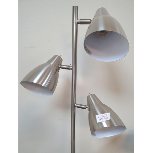 518 - Modernist, free-standing lamp in bushed stainless steel