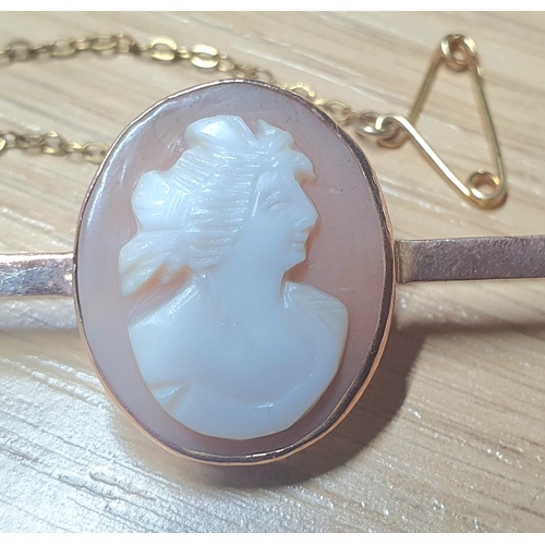 633 - Antique cameo on a 9ct gold setting, bar-brooch,

5.8 grams gross