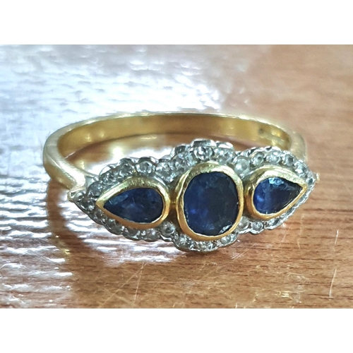 643 - 18ct GOLD SAPPHIRE & DIAMOND RING,

3.5 grams gross            size P