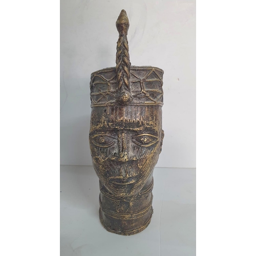 875 - West African bronze head sculpture, possibly Benin,

2.1 kilos           33 cm tall