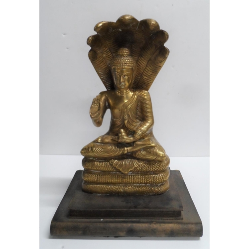 977 - Large brass Hindu Goddess on plinth,

28cm tall