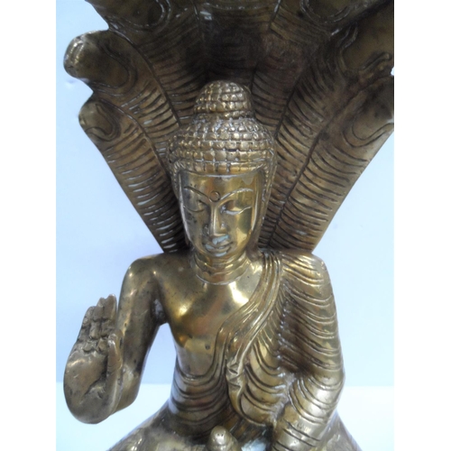 977 - Large brass Hindu Goddess on plinth,

28cm tall