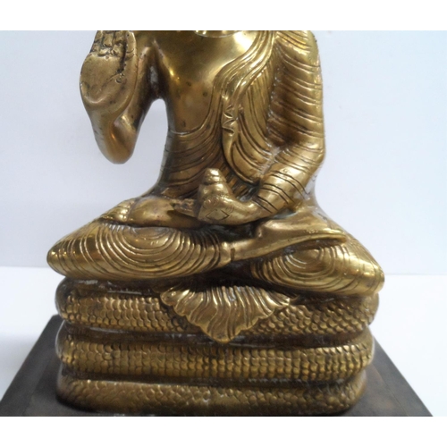 977 - Large brass Hindu Goddess on plinth,

28cm tall