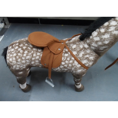 991 - Childs over-sized stuffed horse that makes horse sounds,

Approx 75 cm tall