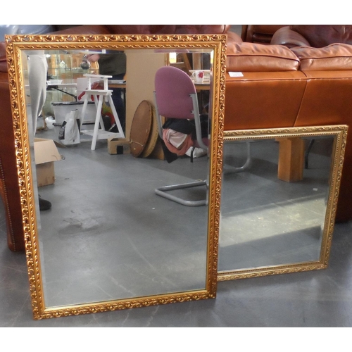 1038 - Two gilt framed square mirrors (2)