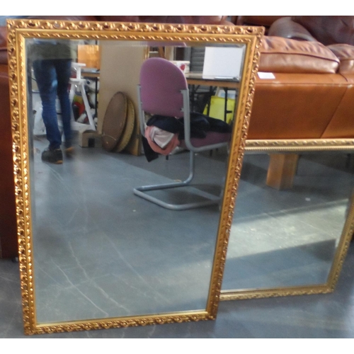 1038 - Two gilt framed square mirrors (2)