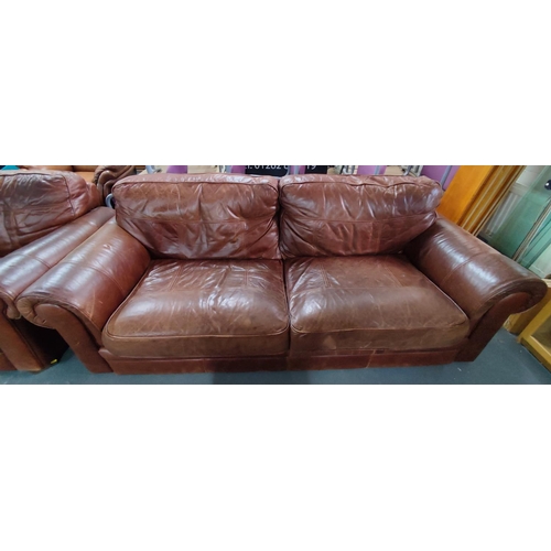 1214 - Three-piece brown leather suite, sofa and two armchairs (3)