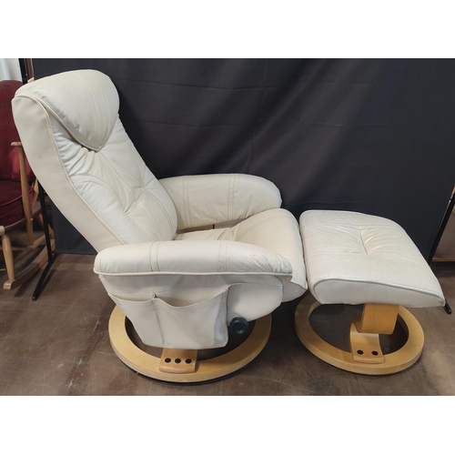 1218 - Cream leather swivel recliner and matching footstool (2)