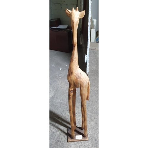 1057 - Large, free standing, wooden Giraffe, 82 cm tall