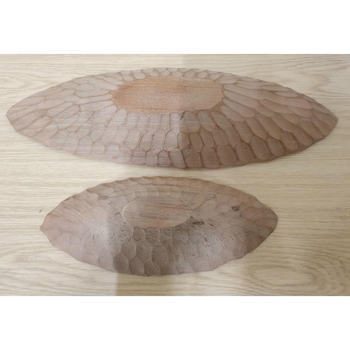 1223 - Pair of different 1970s/80s hand carved table-top wooden shallow bowls (2)