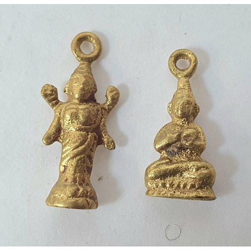 35 - Four unmarked Indian gold charms together with a pair of unmarked gold coloured earrings (6 grams) t... 