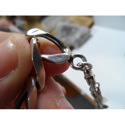 56 - Cahoons cased chunky gents 925 silver bracelet,

30 grams