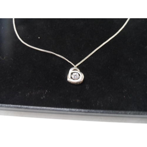 57 - Boxed silver ladies necklace and pendant,

34 grams