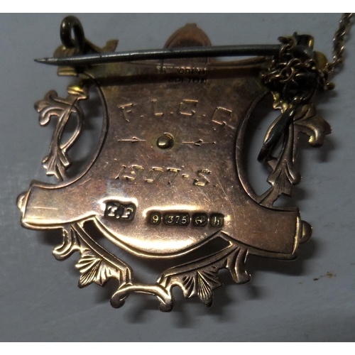 58 - Old 9ct gold fob/medal with dragon decoration, converted to a brooch,

5.2 grams