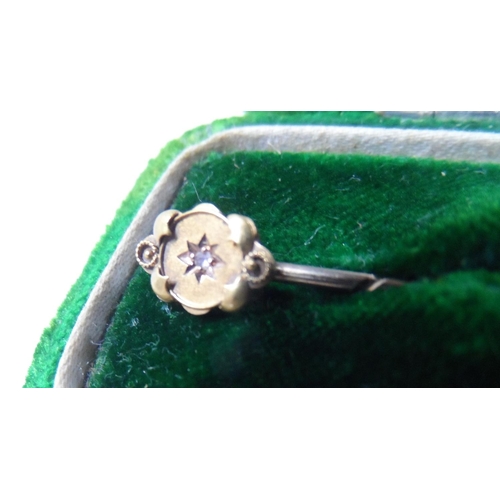 60 - 15ct gold pin badge with solitaire diamond in presentation case,

1 gram gross