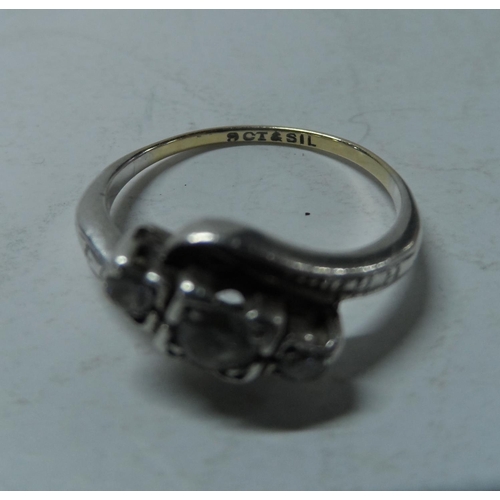 74 - 9ct yellow gold set with 3 round cut illusion set in silver ring,

2.2 grams gross