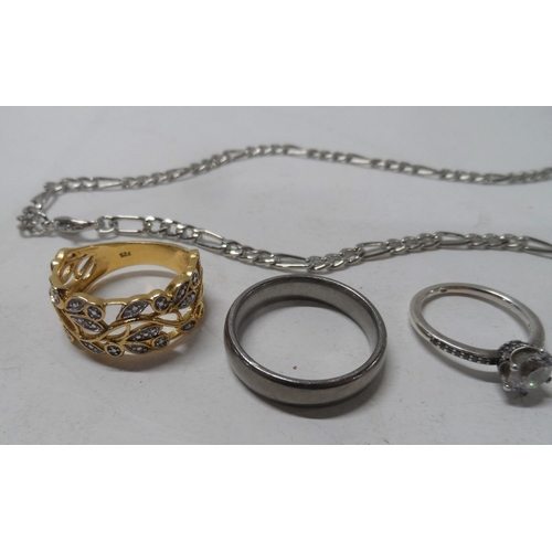 77 - Four silver rings together with a silver flat-link necklace and a Titanium wedding ring (6)