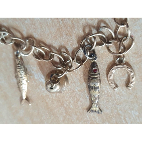 78 - 9 ct gold charm bracelet with 6 charms,

11.6 grams