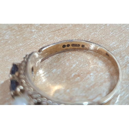 81 - 9ct Rose gold ring with central pearl flanked by 2 Garnets to either side,

3.5 grams gross         ... 