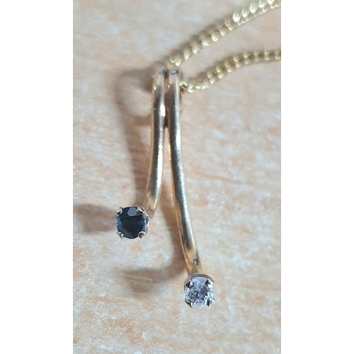 89 - Ladies 9ct gold chain together with a 9ct gold pendent with a Diamond & Sapphire,

3 gram gross     ... 