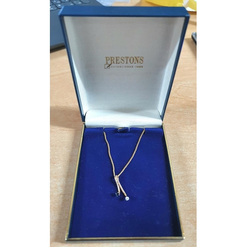 89 - Ladies 9ct gold chain together with a 9ct gold pendent with a Diamond & Sapphire,

3 gram gross     ... 