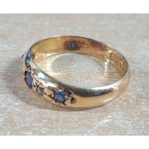 90 - 18ct gold & 3 Sapphire ring,

2.1 grams gross          size N