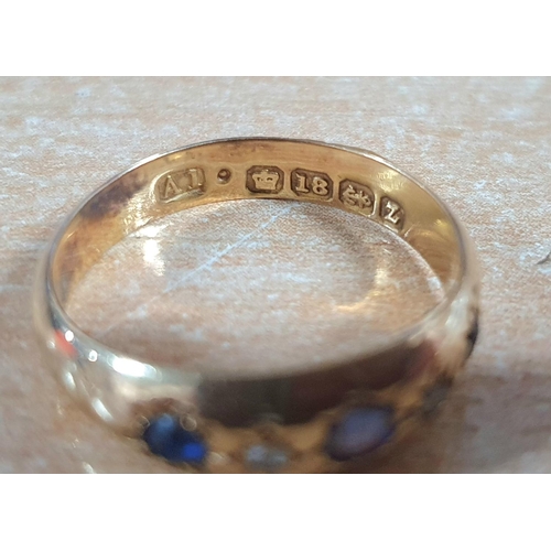 90 - 18ct gold & 3 Sapphire ring,

2.1 grams gross          size N