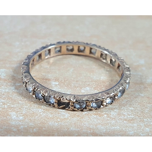 96 - 9ct gold eternity ring containing diamonds and semi-precious stones (a/f),

1.7 grams gross         ... 