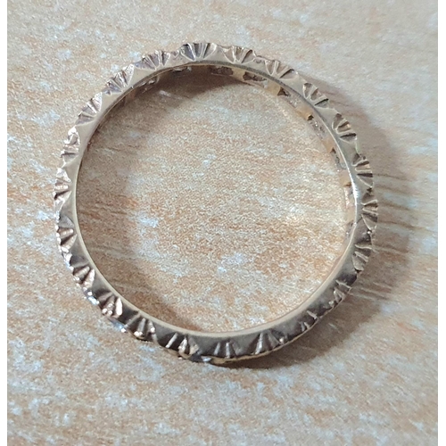 96 - 9ct gold eternity ring containing diamonds and semi-precious stones (a/f),

1.7 grams gross         ... 